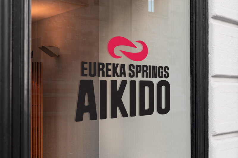 window-store-front-with-martial-arts-logo