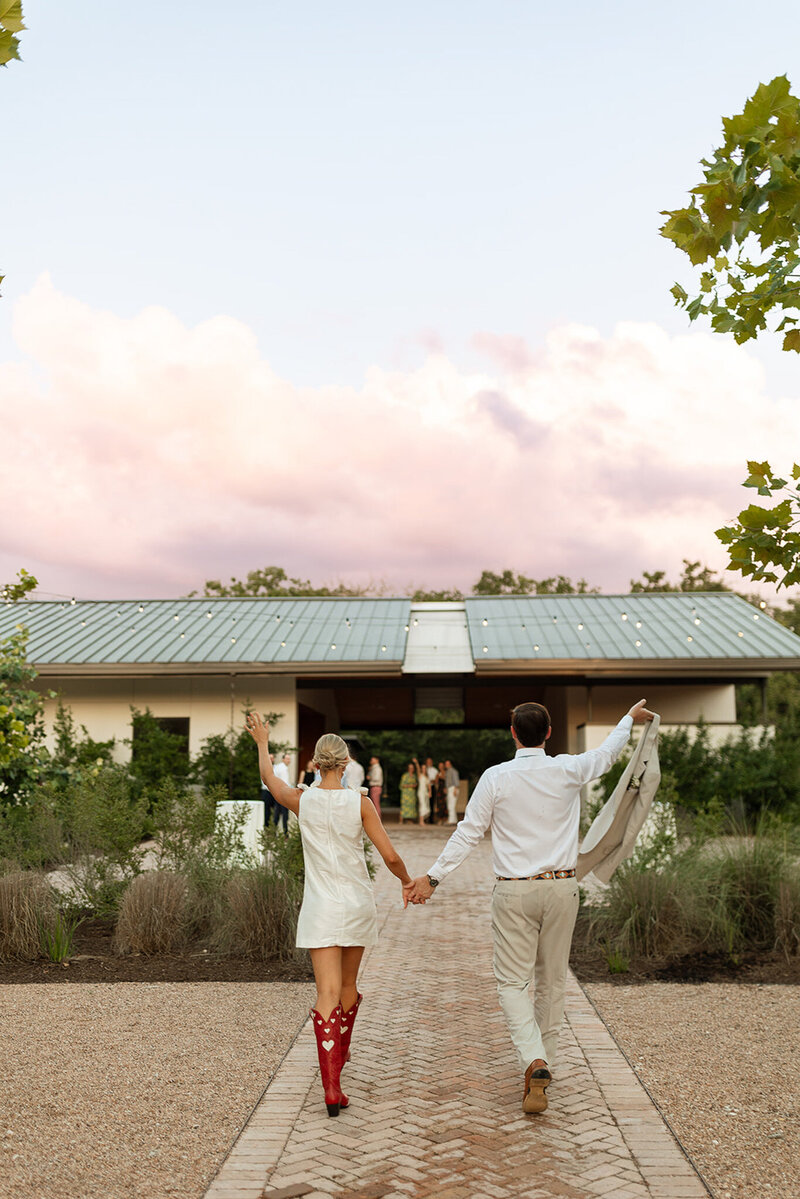 Bride and groom laughing at the wayback