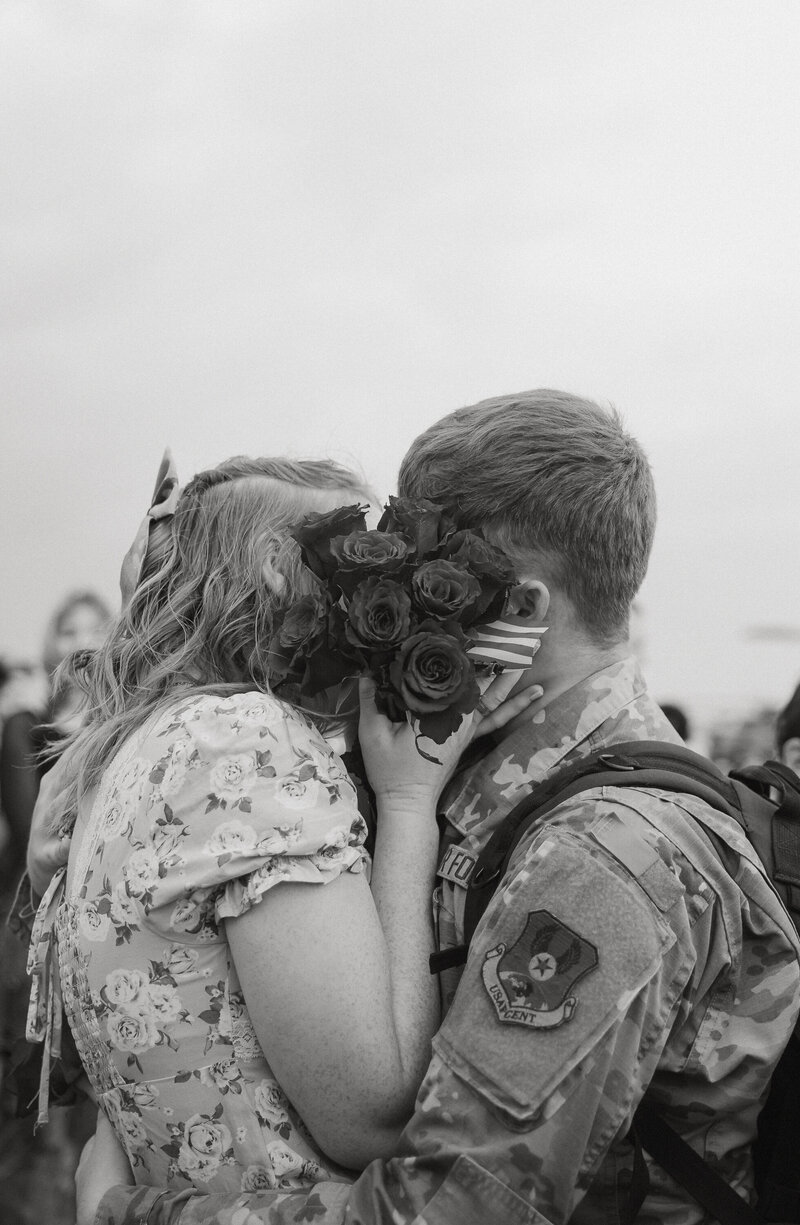 Intimate and joyful flight line military homecoming session at Dyess Air Force Base in Abilene, TX