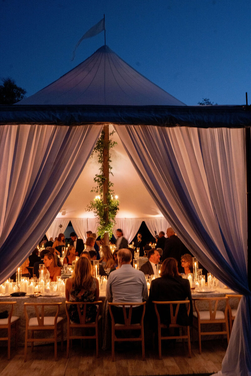 Bride and groom spinning around on NYC rooftop