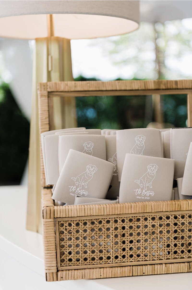 basket at reception with wedding favors