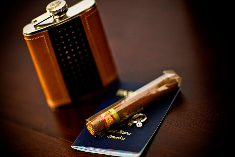 Passport, cigar and wedding ring