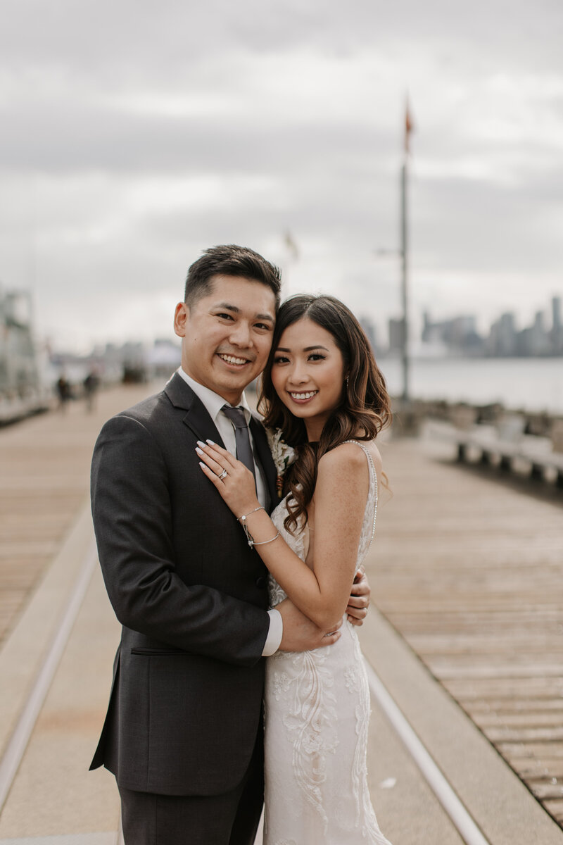 Couple portrait at the North Vancouver pier.