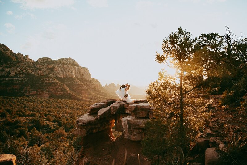 man and woman walk in sedona for engagement photos