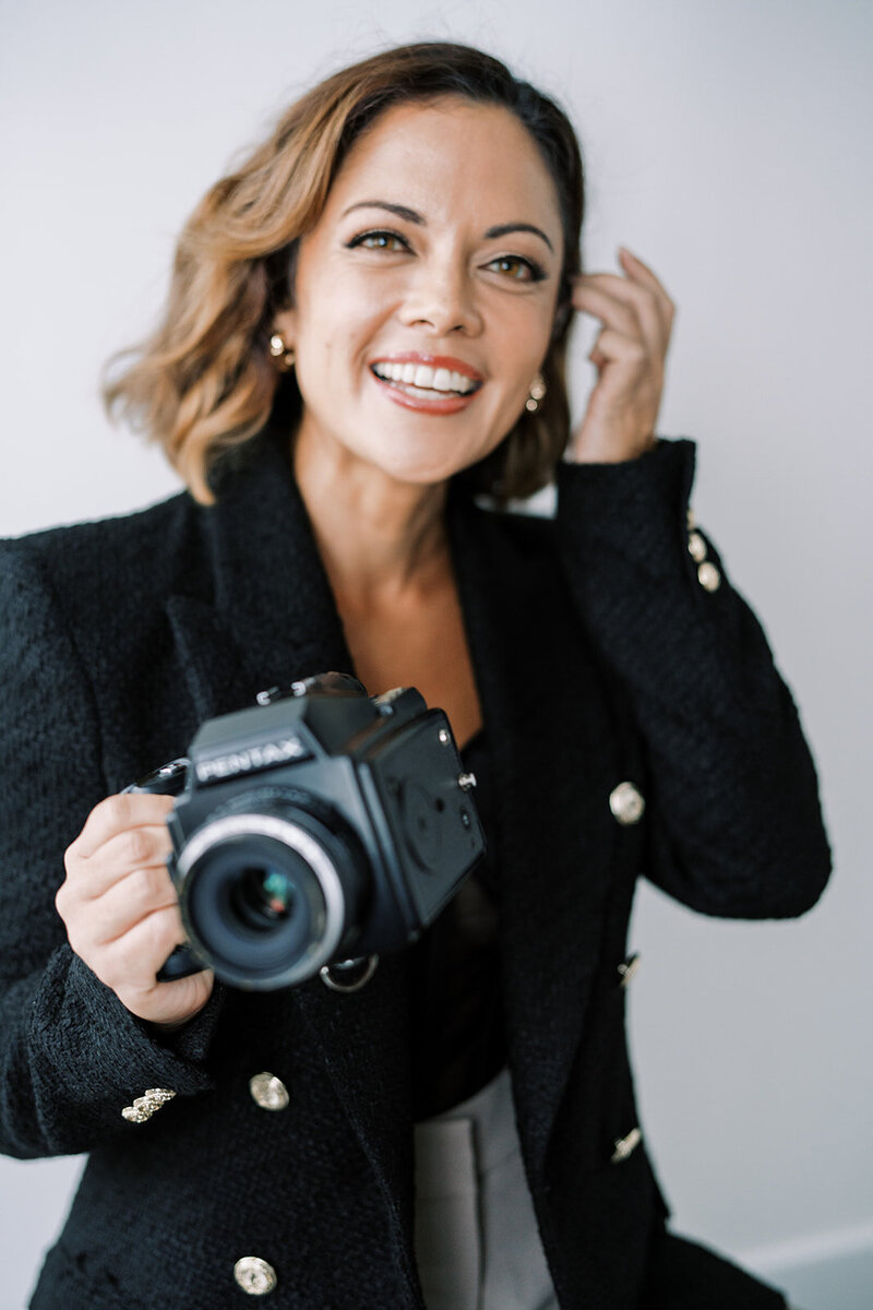 Self portrait of Megan Moura Hawaii and Destination Wedding Photographer