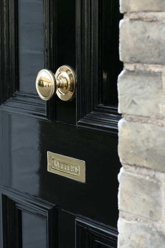 black lacquer and brass door