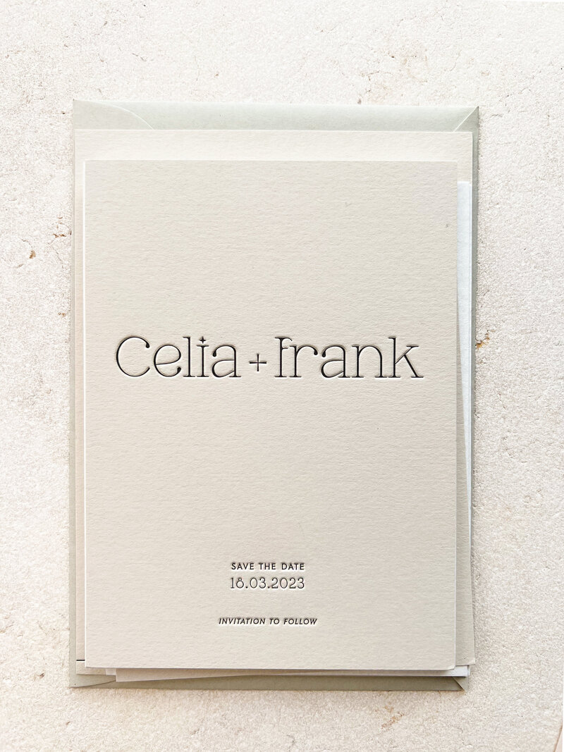 Celia letterpress  printed wedding invitation and envelope stacked