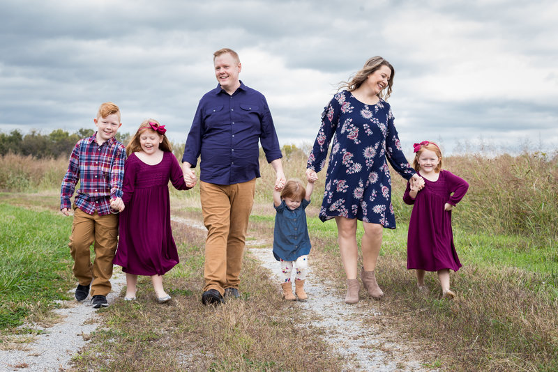 Chic and sophisticated formal family portrait captured by Jeremy Ellsworth Photography, Kansas City's premier photographer for timeless and upscale family photos.