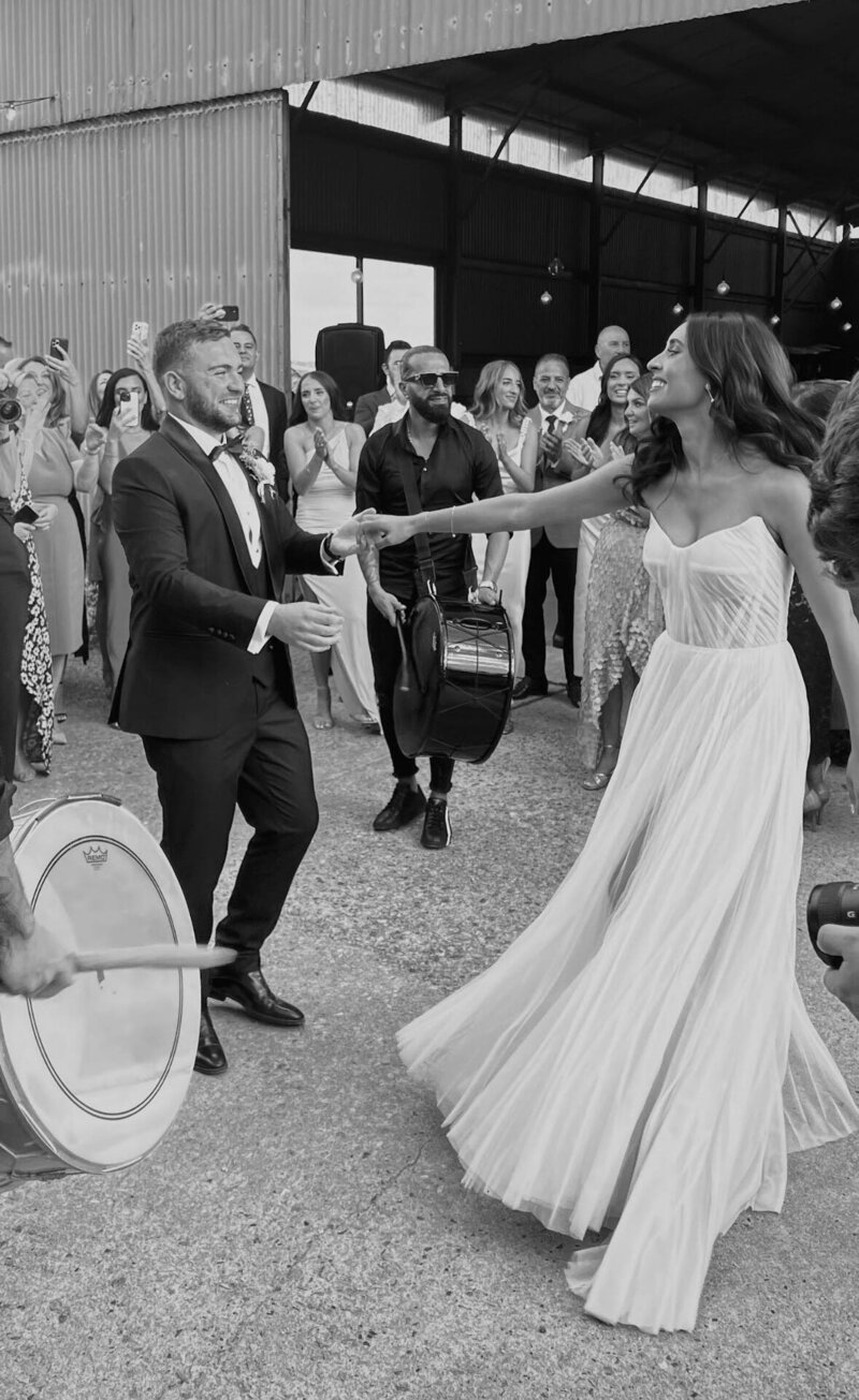 Dynamic couple enjoying their first dance, showcasing LIMCO’s ability to infuse fun and tailored choreography into wedding celebrations.