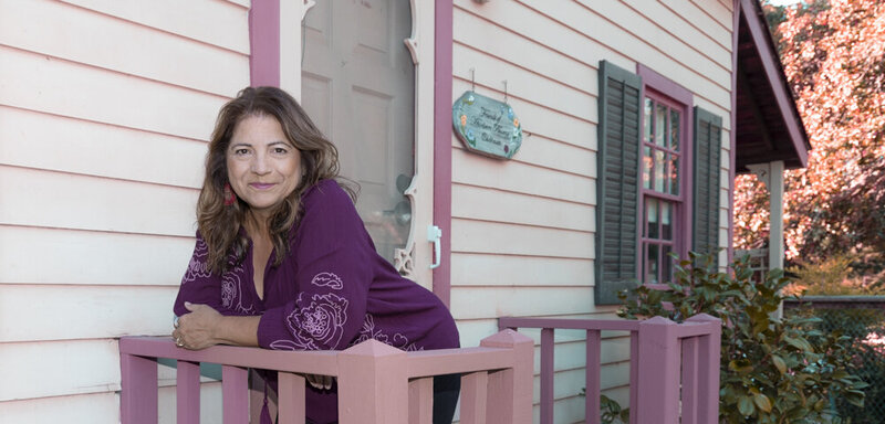 Image of Leticia outside smiling