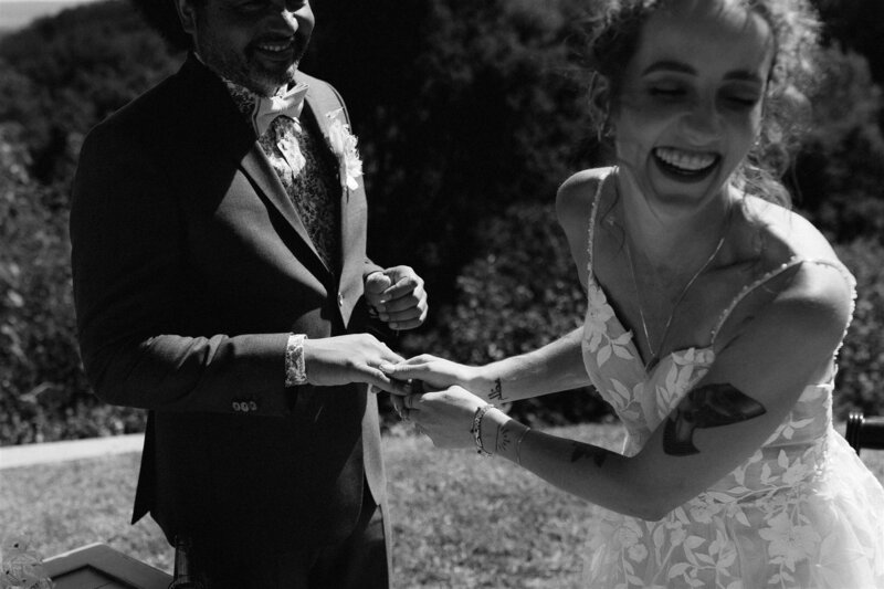 bride and groom exchanging rings