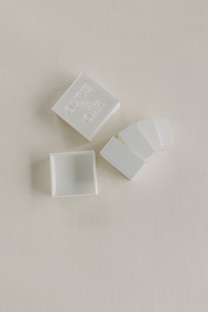 Square blocks used to add height and interest to flat lay designs