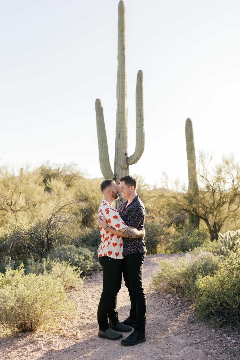 Couple hug and embrace in the Arizona desert.