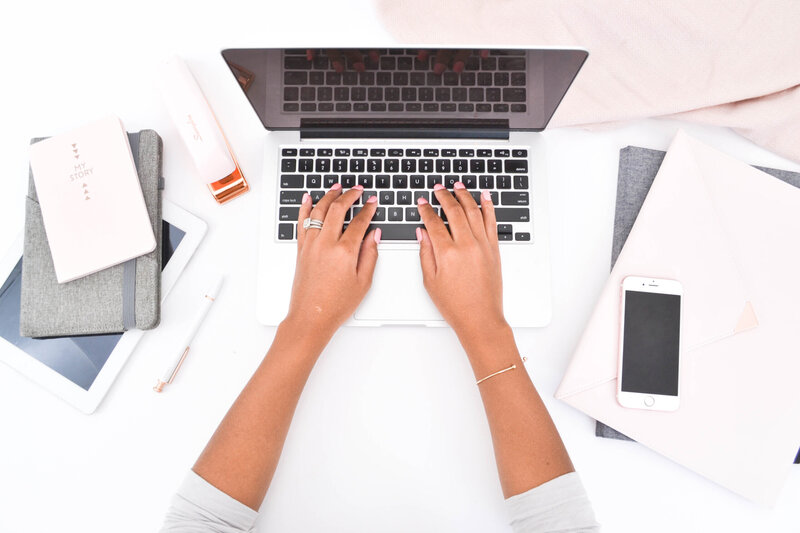 Woman's hands on laptop