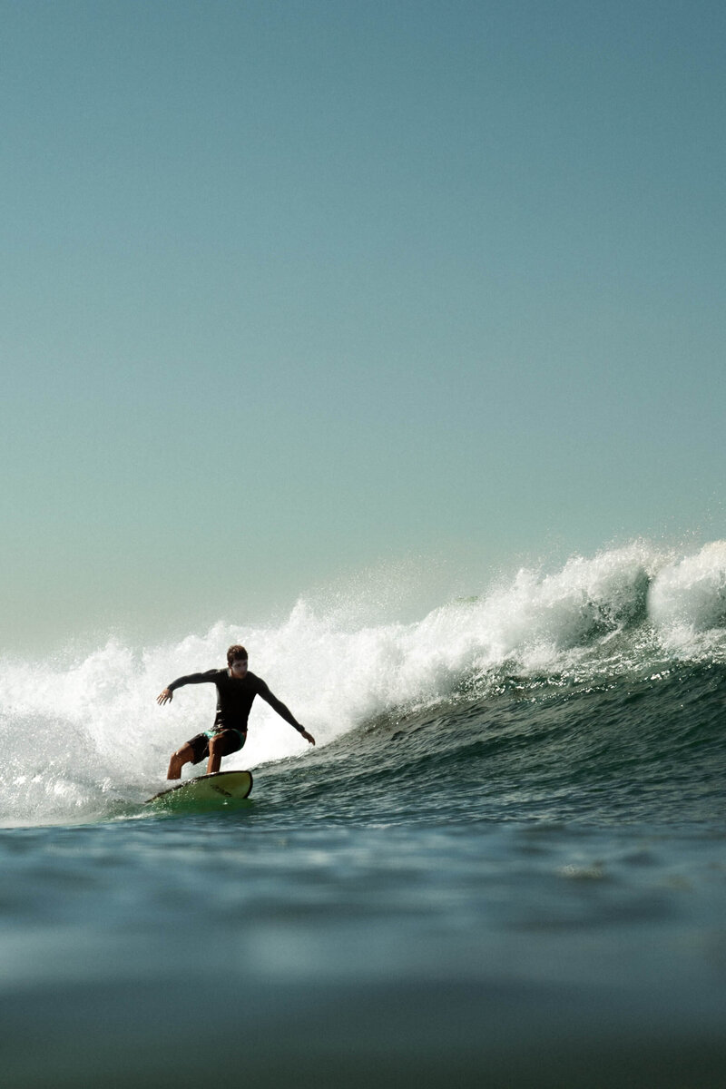 A man surfing a wave