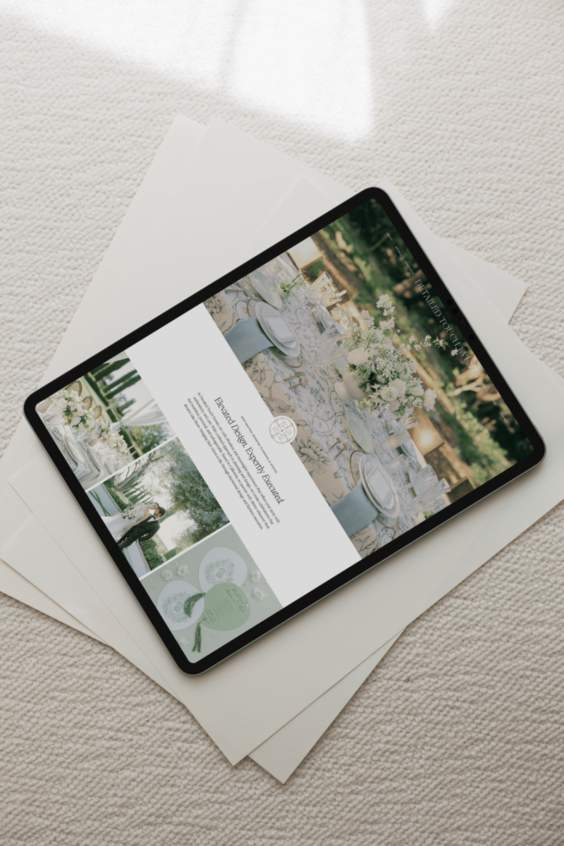 An iPhone leaning against a stone wall.