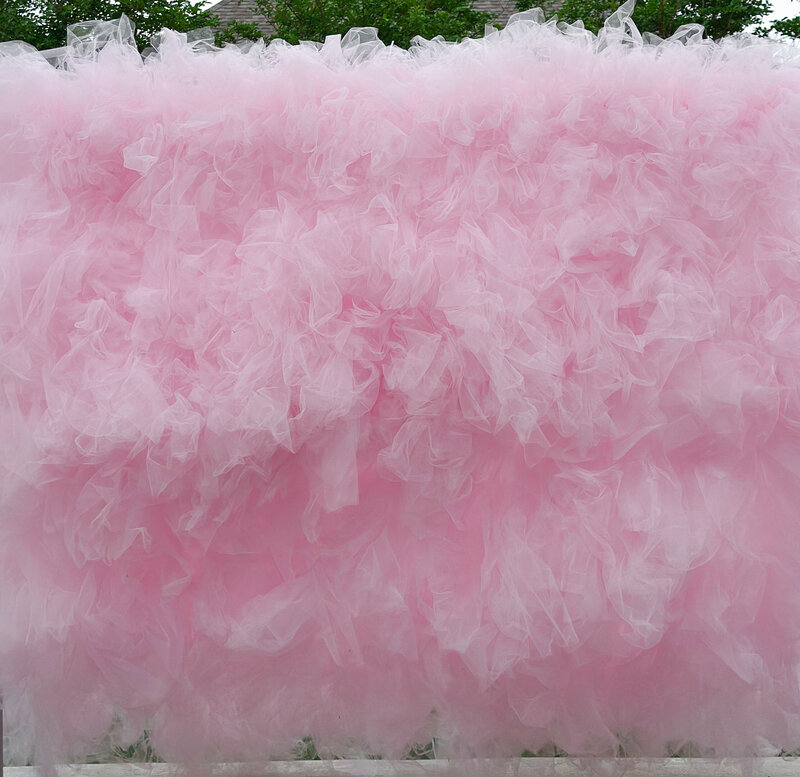 Large pink tulle wall.