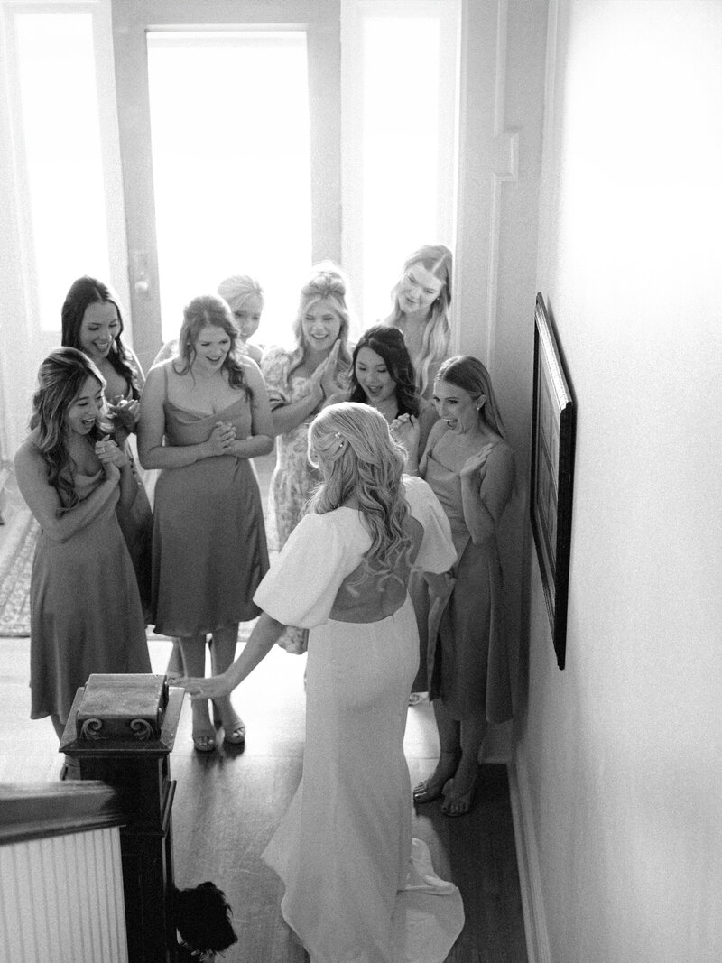 bridesmaids reacting to brides wedding dress