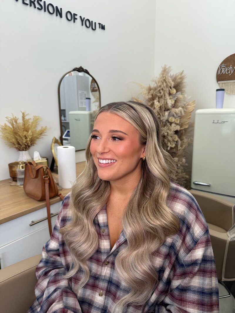 Bride showing off her styling from one of our bridal makeup packages.