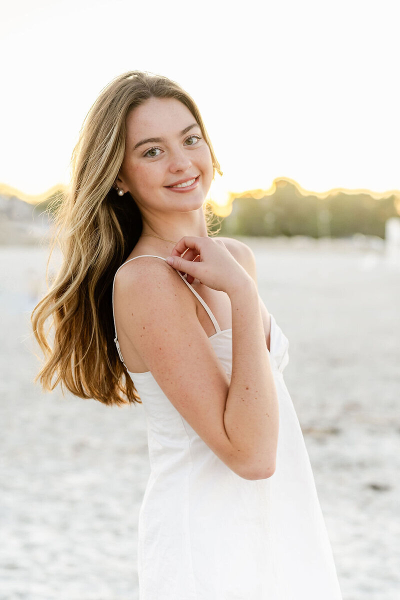 senior portrait on the south shore beach