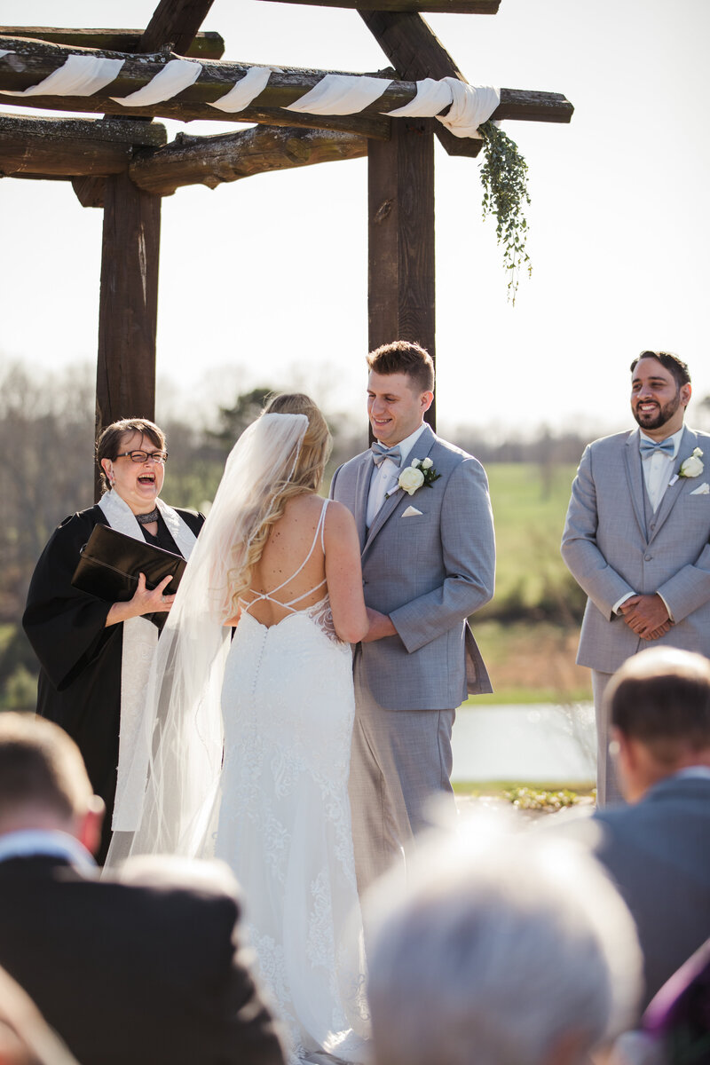 bride and groom during outdoor wedding ceremony