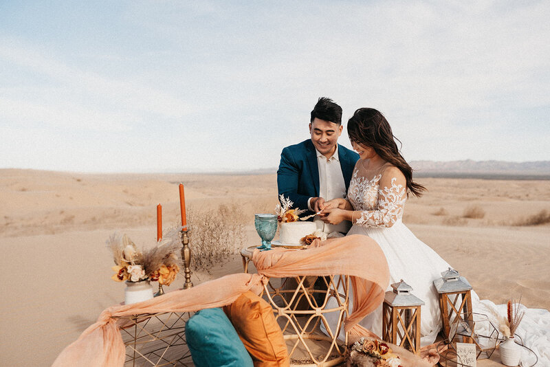 Elopement picnic in the sand dunes - Colby and Valerie Photography