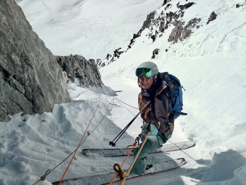 Alison Reuter of A/Revelation designs skies down a mountain in Aspen