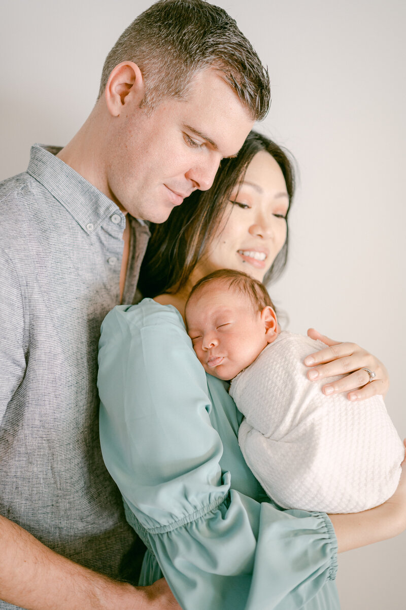 Newborn family portrait light and airy