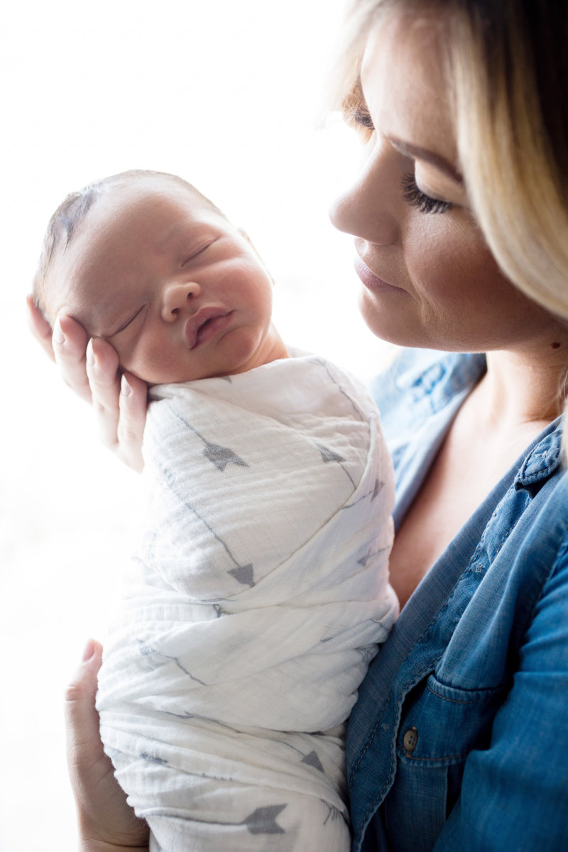 Mom holding newborn - Jen Madigan - Naperville IL Lifestyle Newborn Photographer