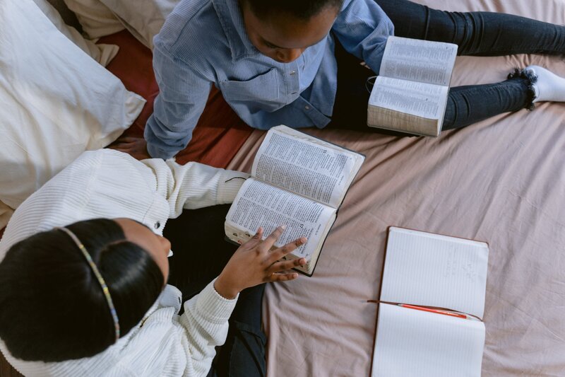 Girls reading the Bible