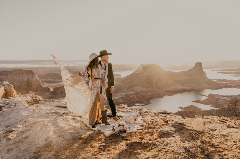 bride and groom on cliff