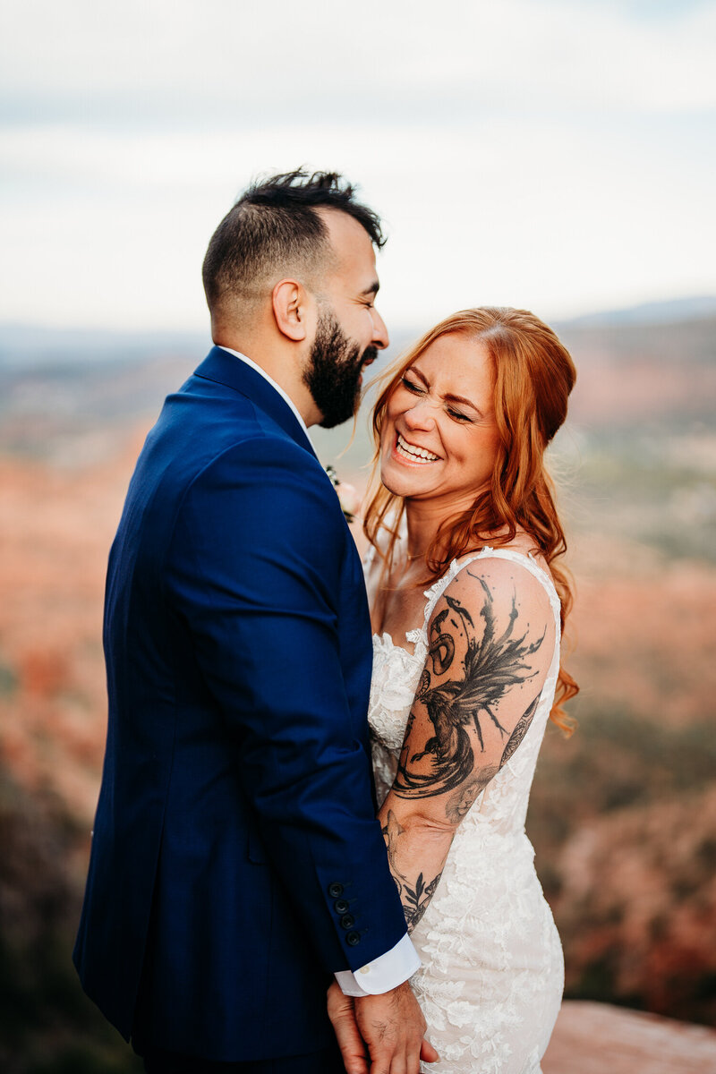bride and groom embracing