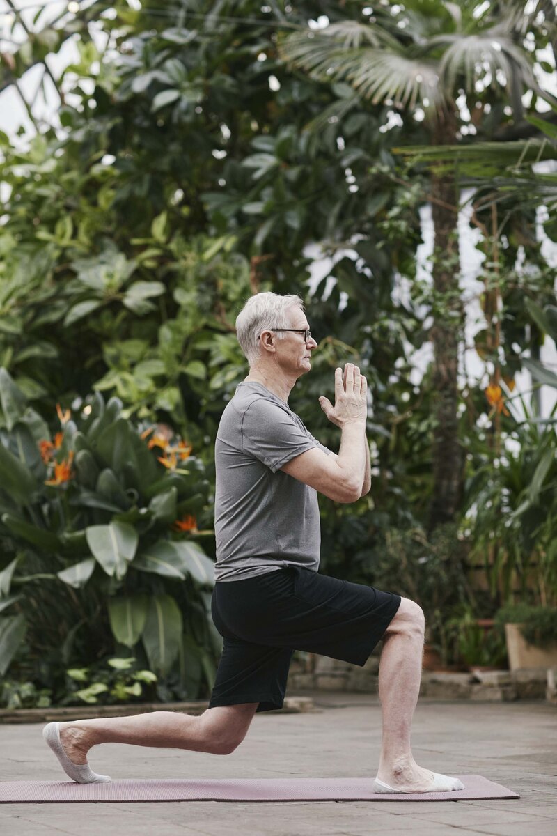Man doing physical therapy outside