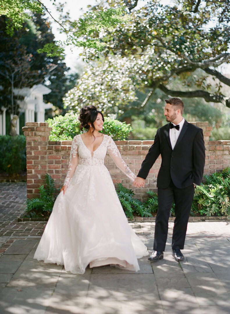 Wedding Photographers Tanya and Harry McSween Sitting on Steps at Biltmore Estate