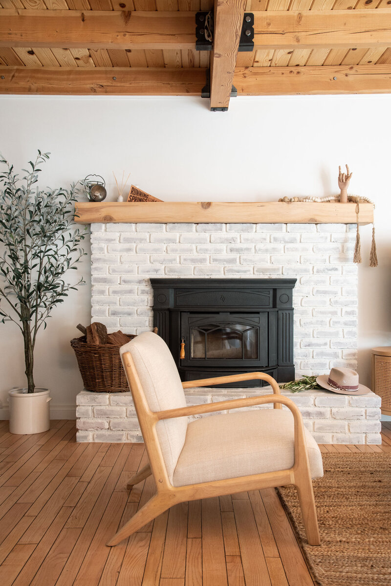 White-cabin-fireplace-vela-imagery