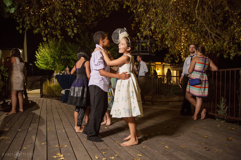 Dancing at an outdoor wedding reception at Prairie Garden Terrace at Chatfield Farms