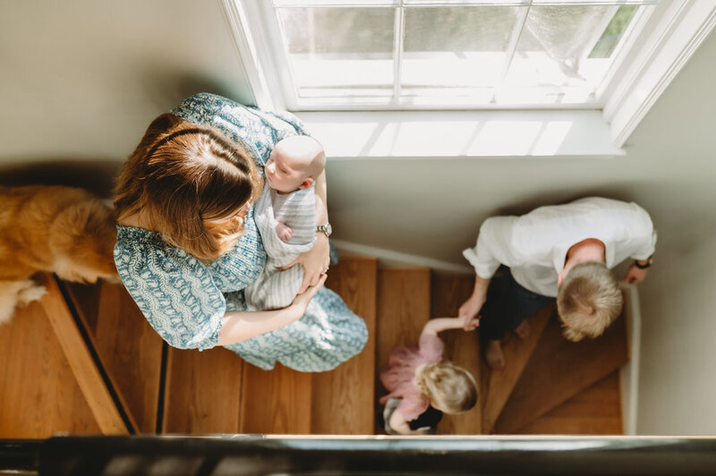 family walking down the stairs