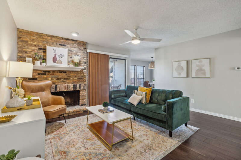 Modern condo for sale in Dallas, TX featuring open-concept living, updated kitchen, and private balcony.