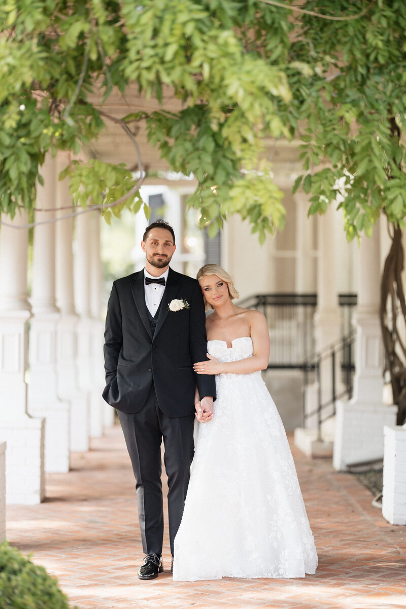 Elegant wedding couple at the historic Swan House in Atlanta during a curated photography workshop.