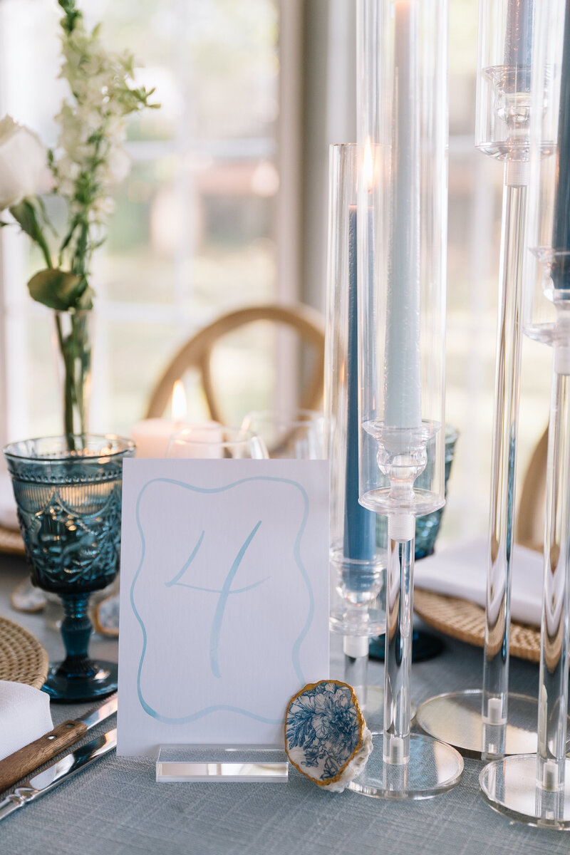 Blue watercolor wedding table number with acrylic stand rental