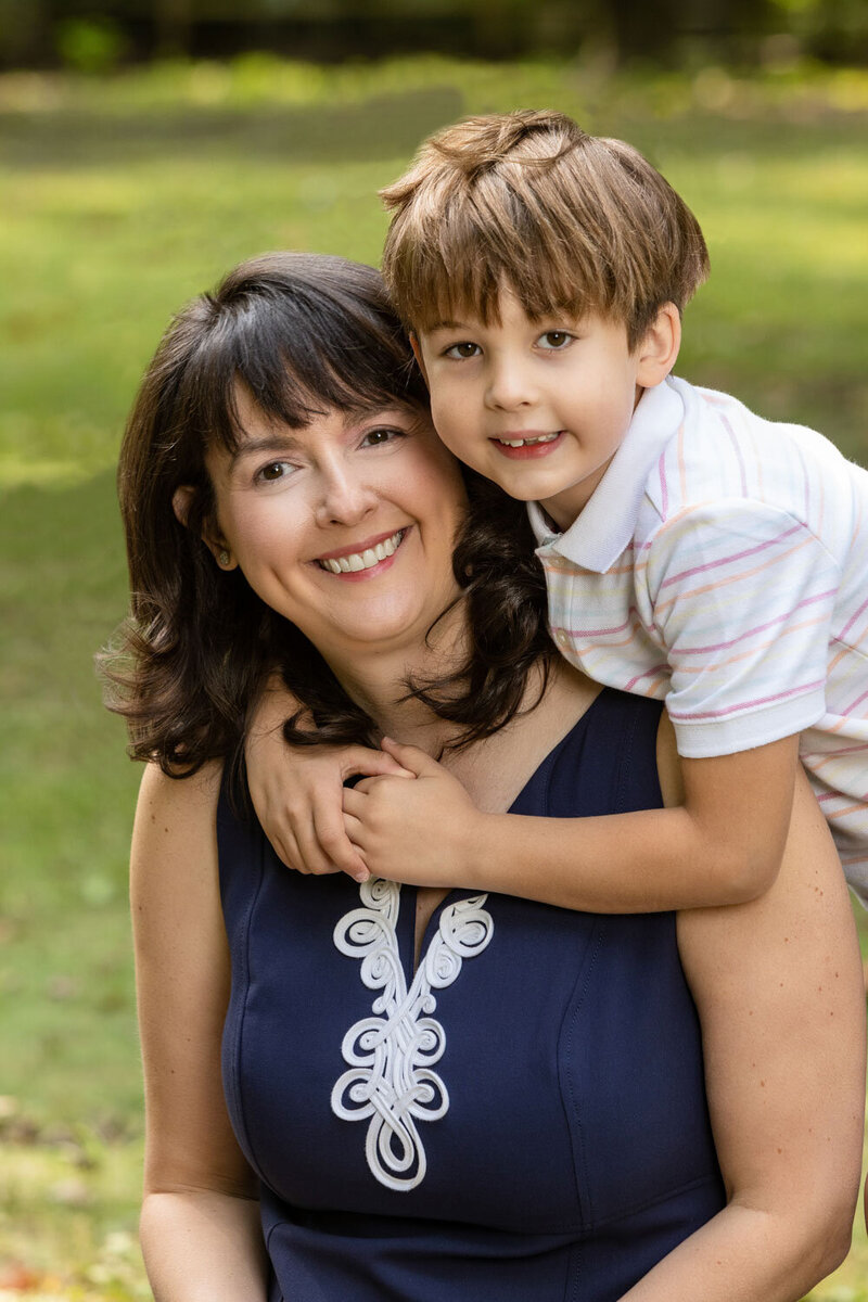 Mother and son portrait in an outdoor setting