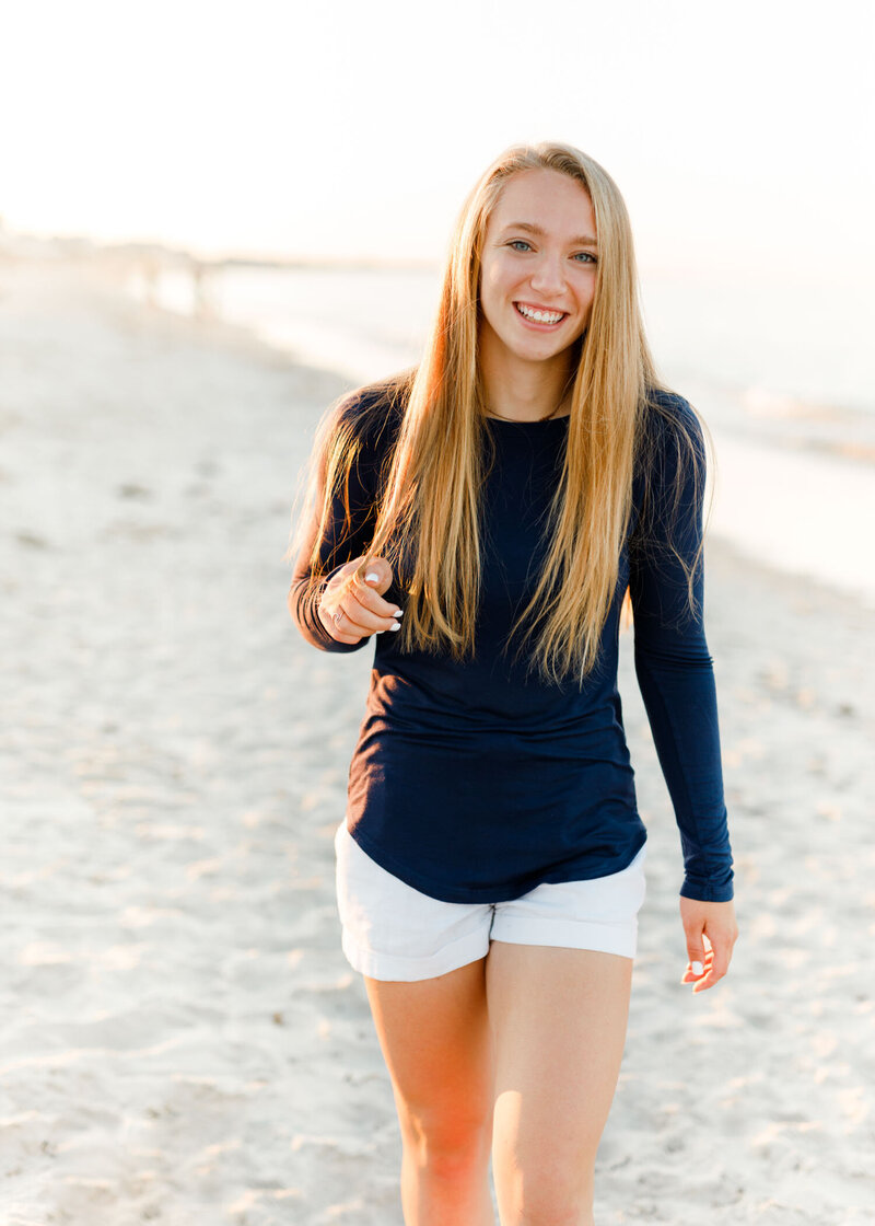 Image by South Shore senior photographer Christina Runnals  | Girl walking on beach