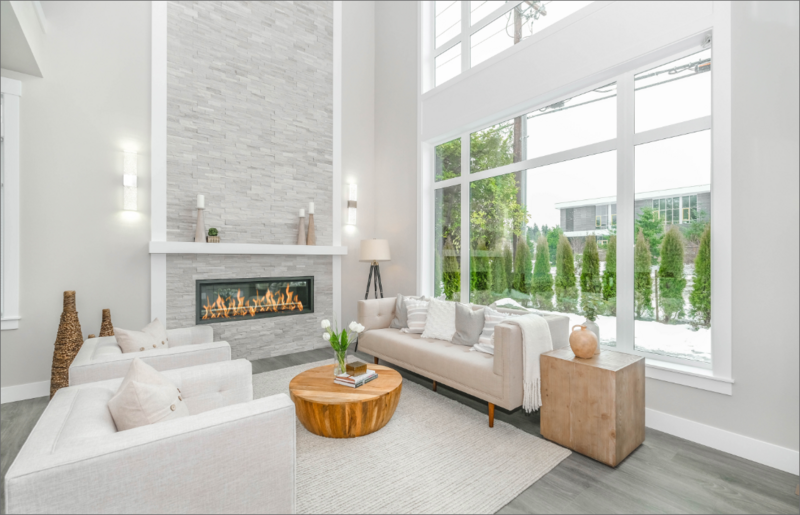 Traditional style large picturew windows that are energy-efficient and double pane so they keep the house cool while adding more natural light.