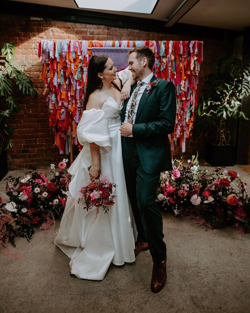 Couple with colourful decor in the Lean-To