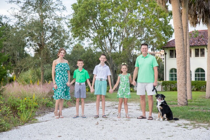 Family in coordinating green outfits at Phillippi Estate Park