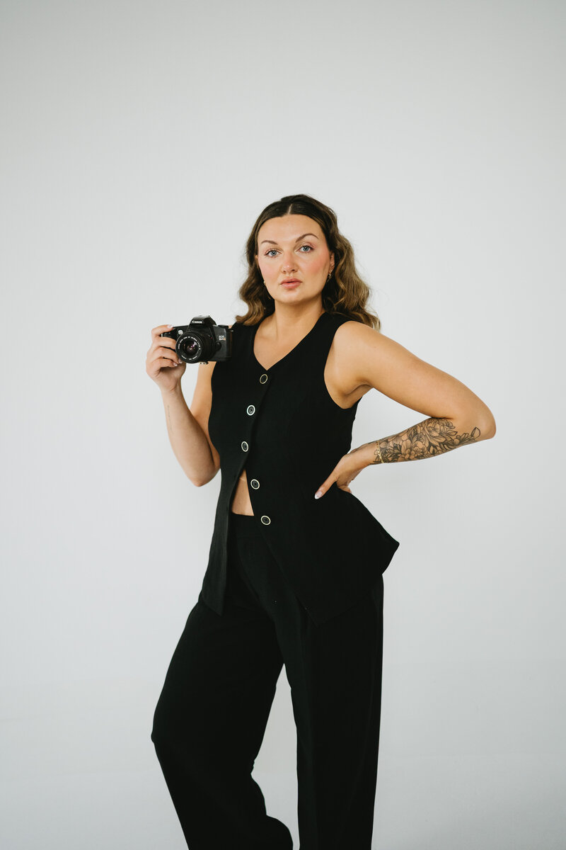 Refined meets real—portrait of a Minnesota-based wedding photographer turning tender moments into timeless art.