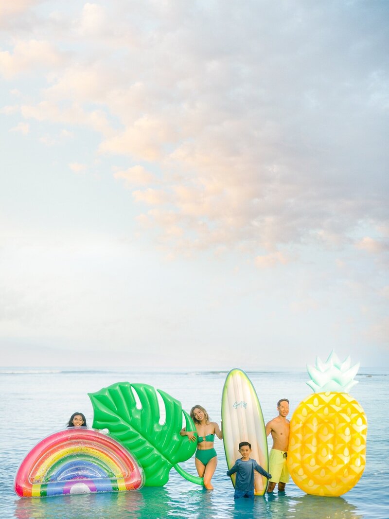 Hawaii float at beach for colorful fun family photos