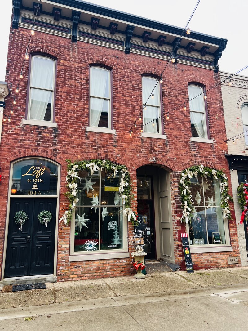 A historic brick building  in  Battle Alley, Holly MI