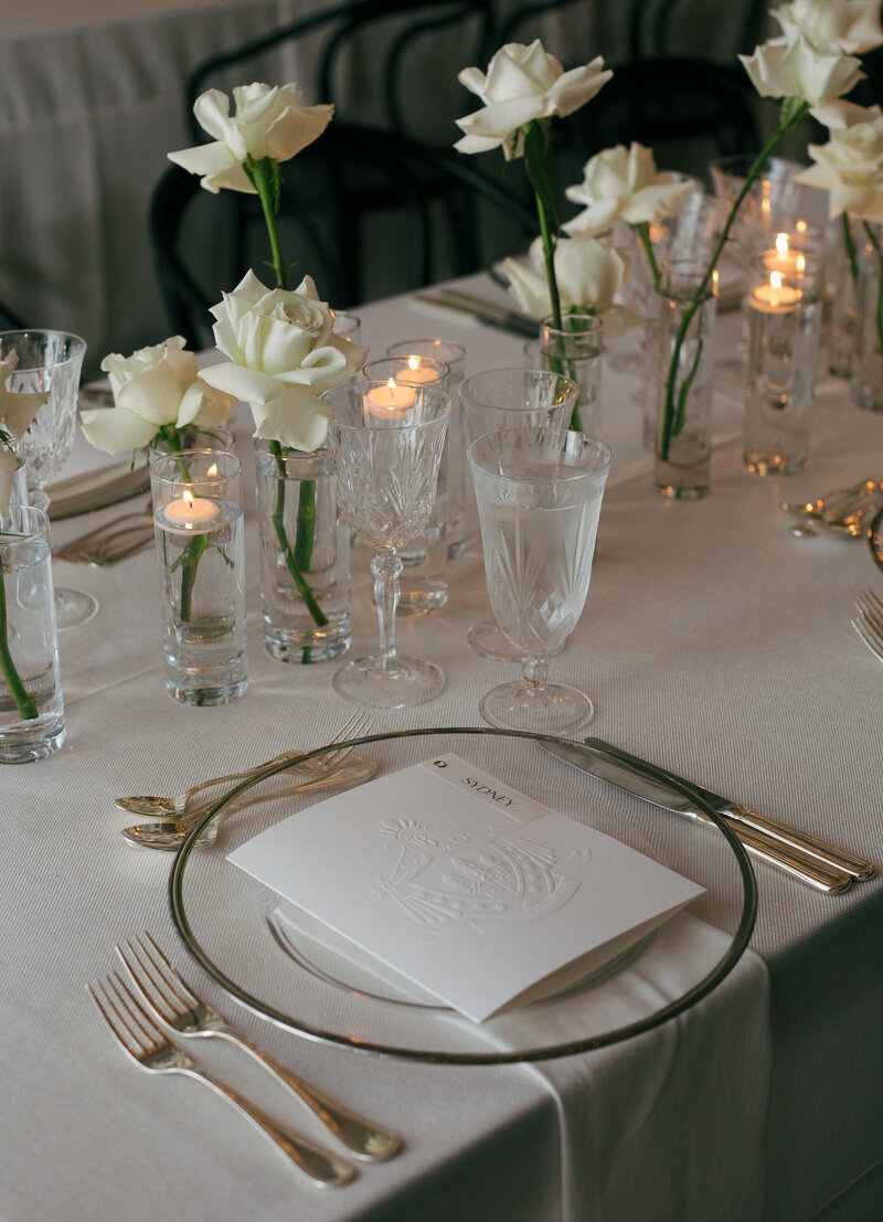 tablescape of white roses and candles