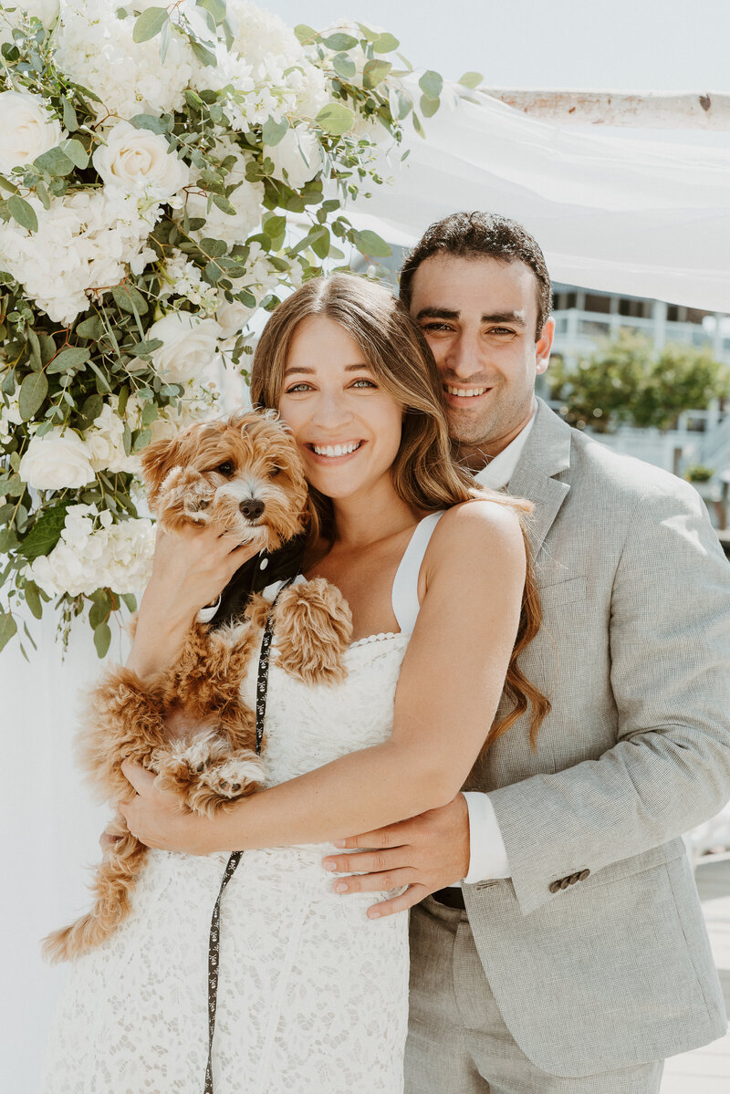 Bride and groom with their dog at Palm Springs wedding